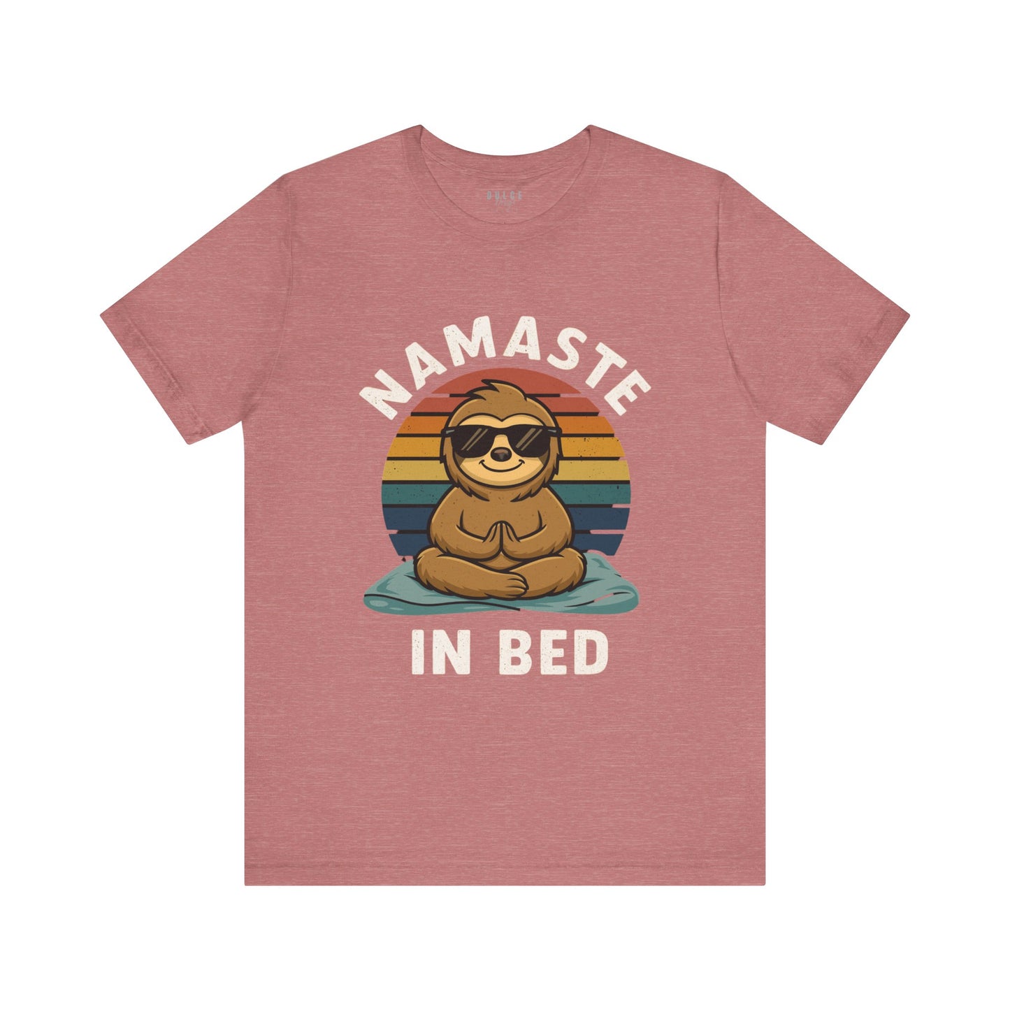 Red t-shirt with a sloth graphic and 'Namaste in Bed' text on a white background