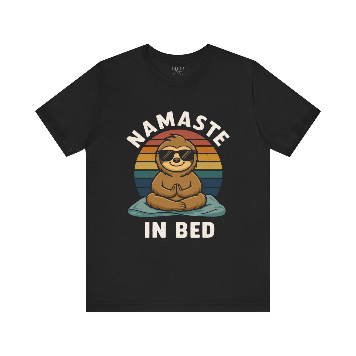 Black t-shirt with a sloth graphic and 'Namaste in Bed' text on a white background