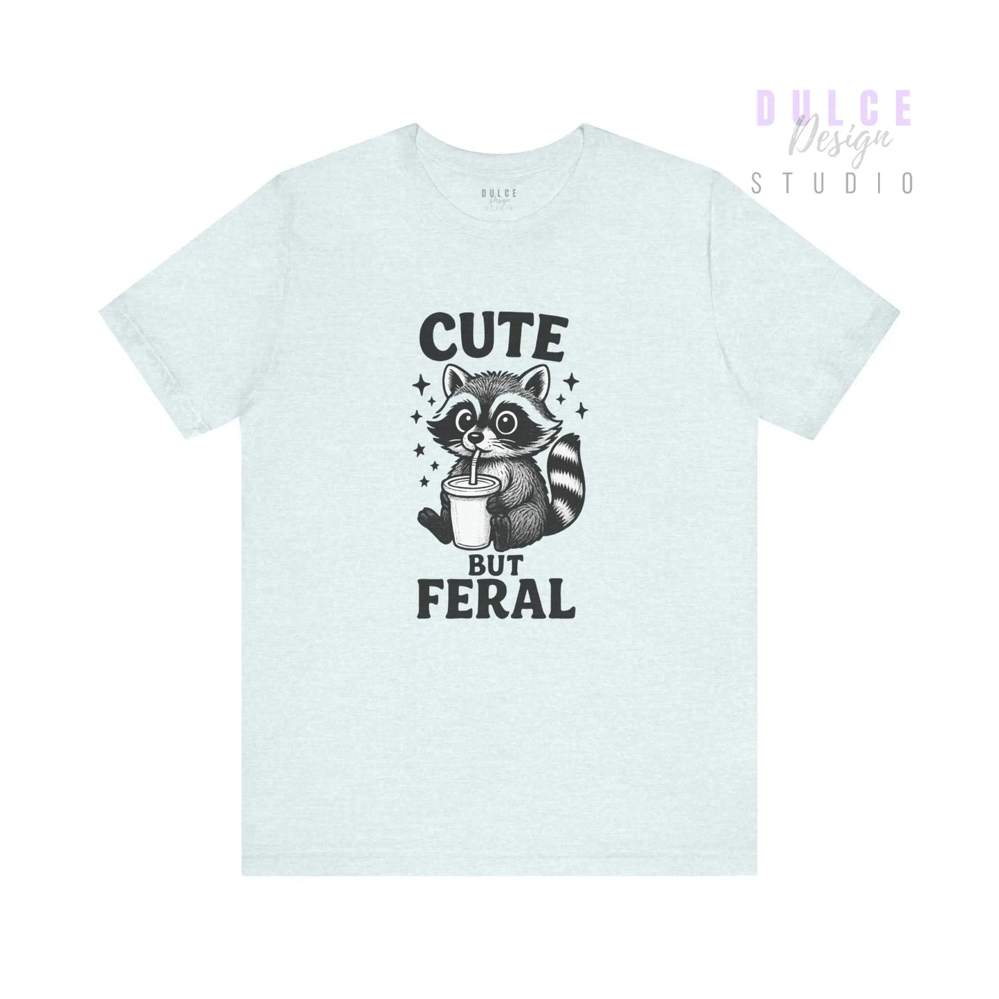 Light blue t-shirt with a raccoon graphic and text on a white background