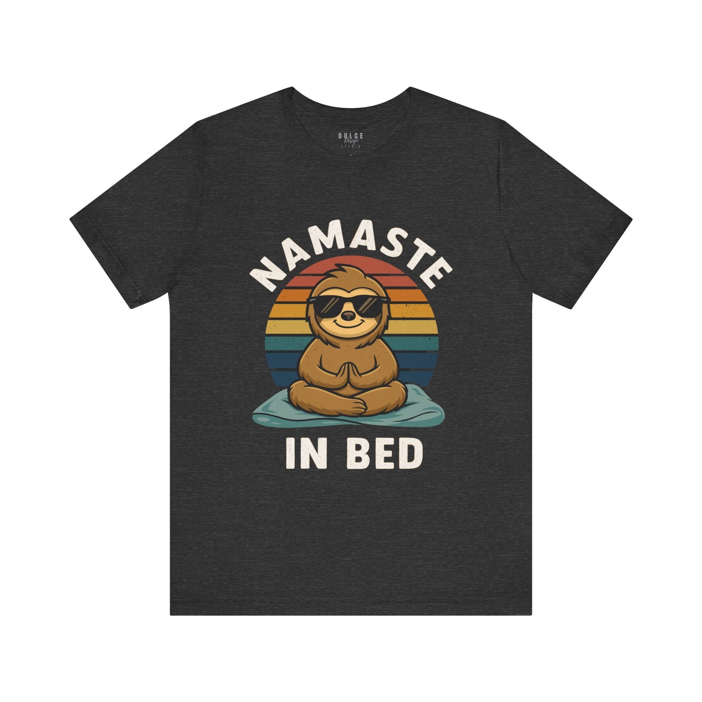 Black heather t-shirt with a sloth graphic and 'Namaste in Bed' text on a white background