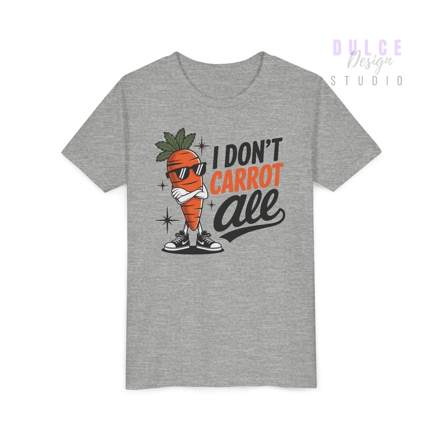 Kids t-shirt with carrot character in sunglasses and text ‘I Don’t Carrot All’ in bold fonts, on athletic heather shirt