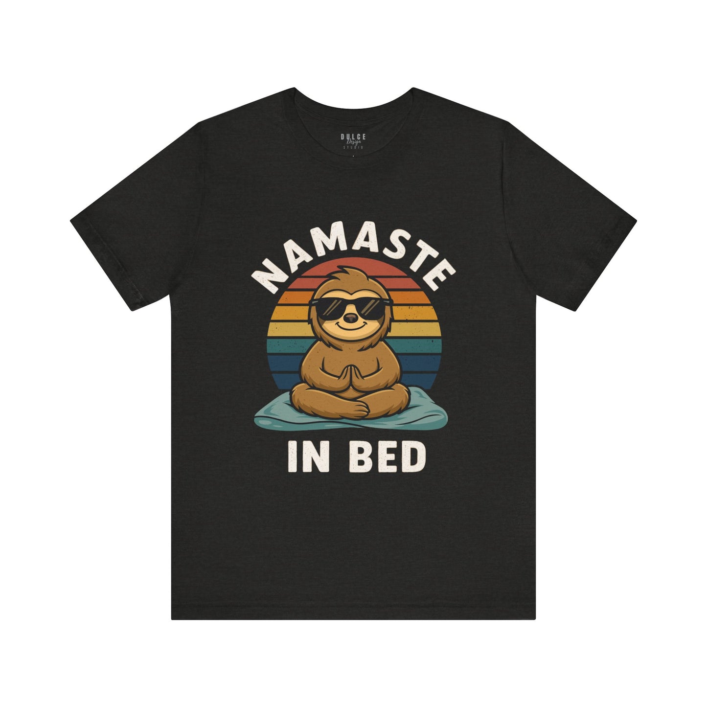Black t-shirt with a sloth graphic and 'Namaste in Bed' text on a white background