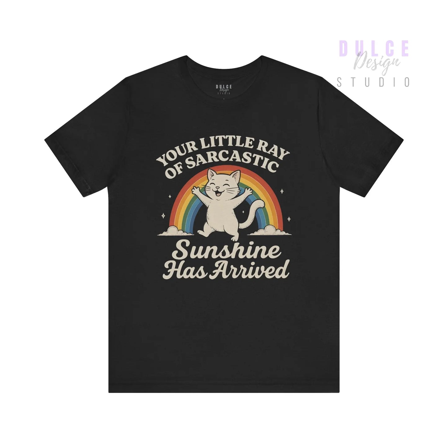 Funny cat graphic tee with retro rainbow and text ‘Your Little Ray of Sarcastic Sunshine Has Arrived’ on dark background