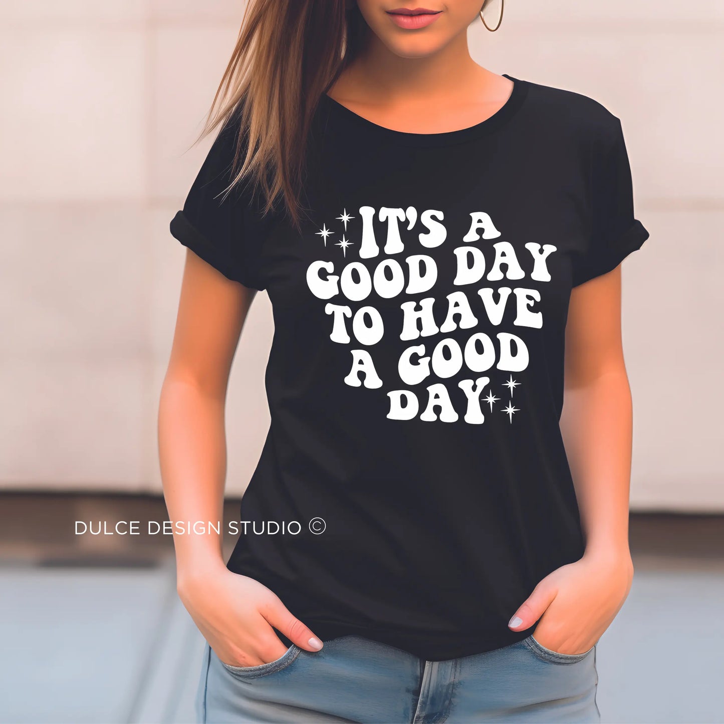 Black t-shirt with retro-style “It’s a Good Day to Have a Good Day” quote design