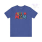 Blue t-shirt with 'AUTISM MOM' text in colorful letters on a white background
