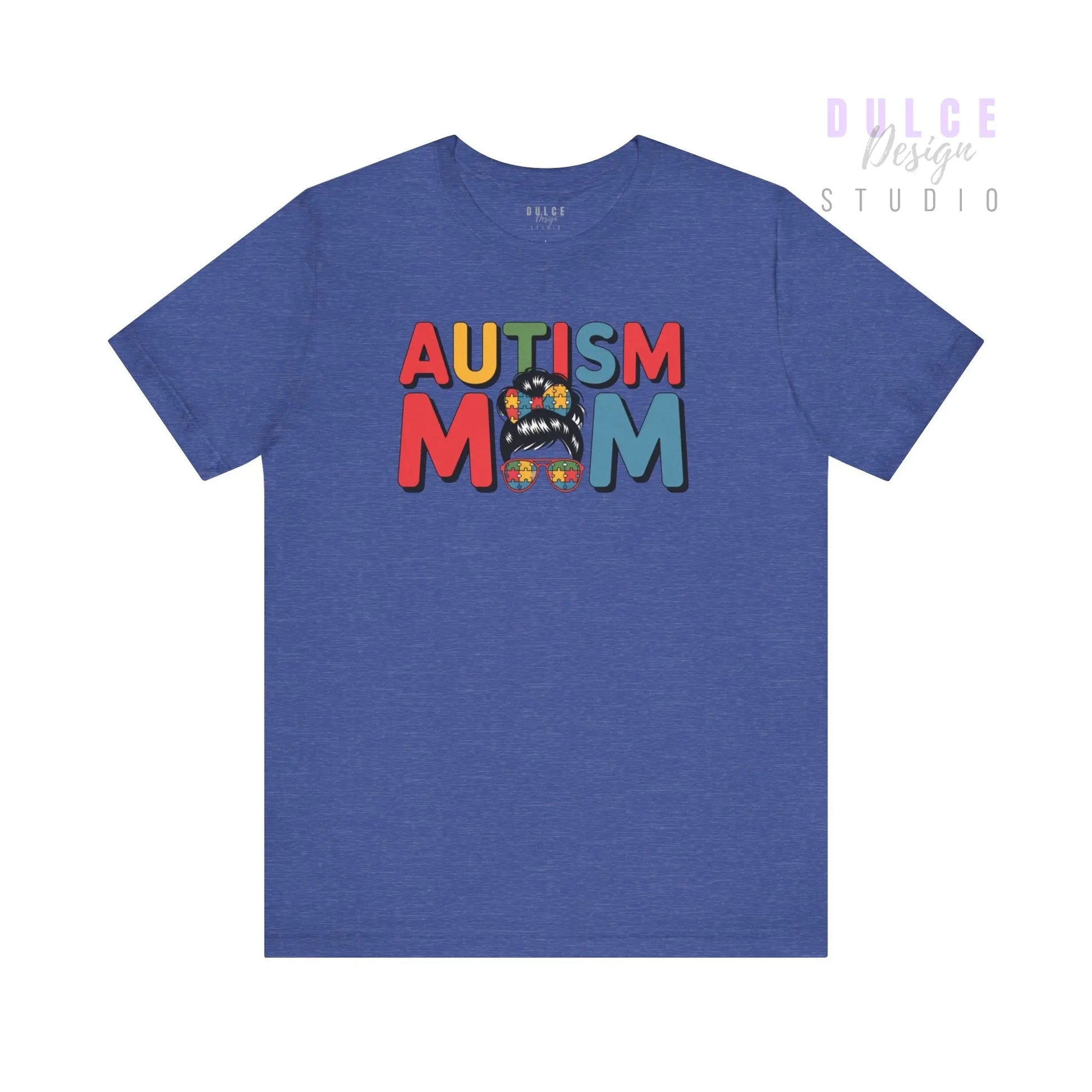 Blue t-shirt with 'AUTISM MOM' text in colorful letters on a white background