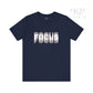 Navy blue t-shirt with 'FOCUS' print on a white background