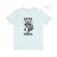Light blue t-shirt with a raccoon graphic and text on a white background