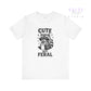 White t-shirt with a raccoon graphic and text 'Cute But Feral' on a white background