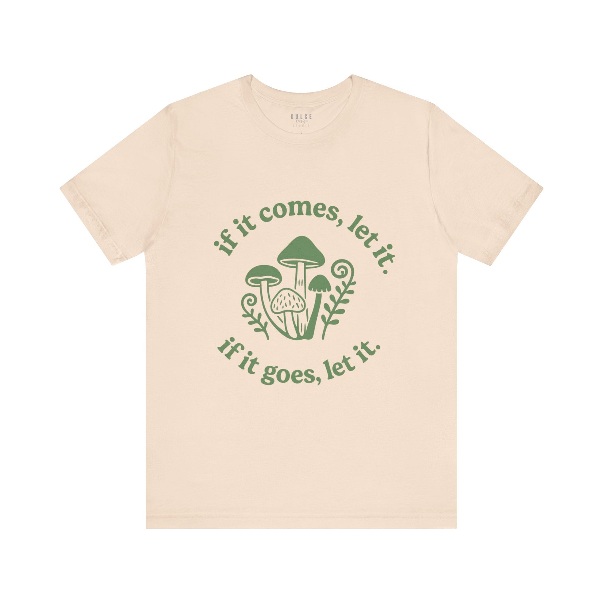 Beige t-shirt with green mushroom graphic and text on a white background