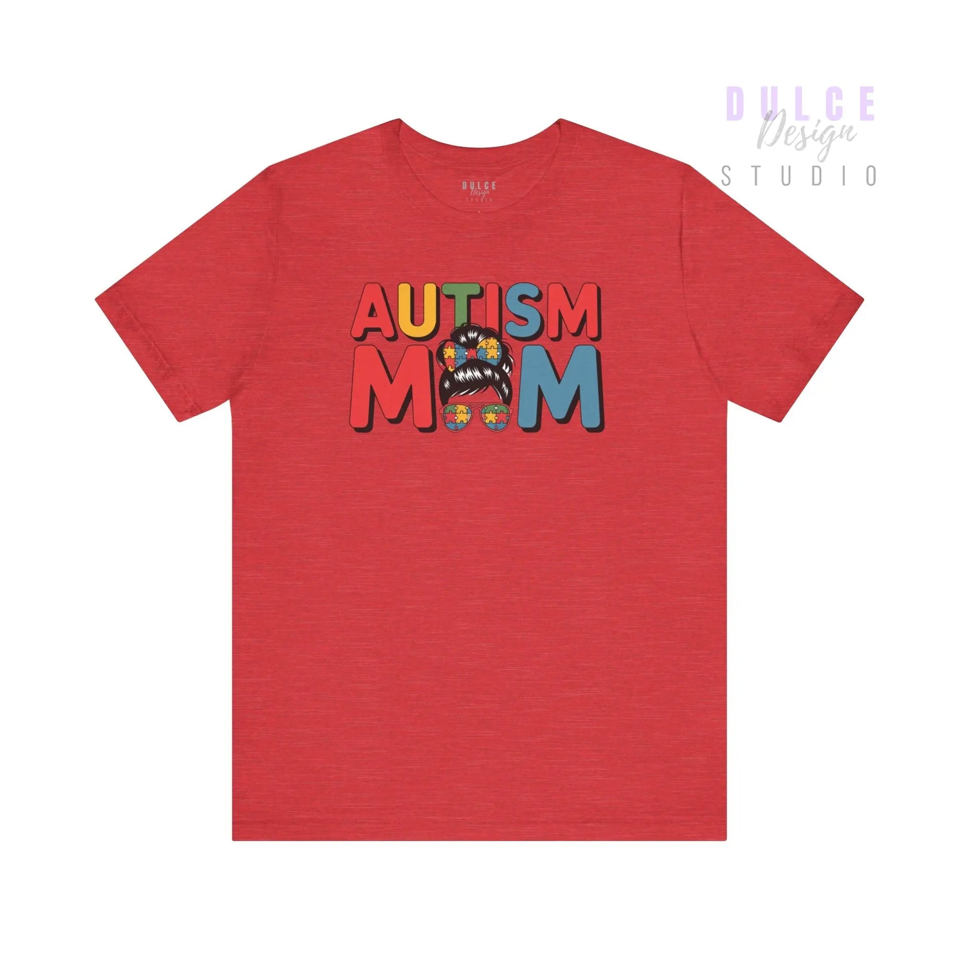 Red t-shirt with 'AUTISM MOM' text and colorful design on a white background