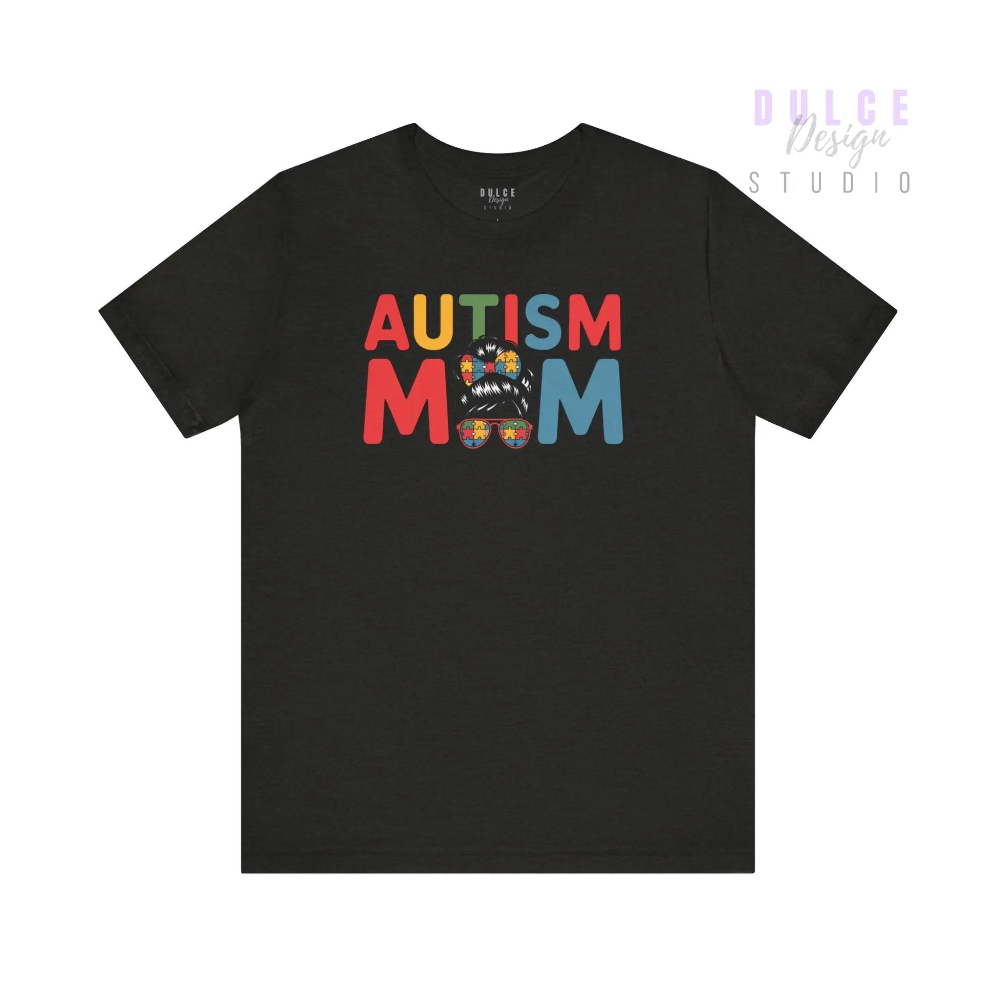 Black t-shirt with 'Autism Mom' text in colorful letters on a white background