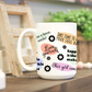 White ceramic coffee mug with colorful positive quotes and floral accents, perfect for an inspirational start to the day.