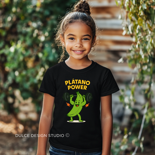 Smiling girl wearing Plátano Power shirt with cartoon plantain lifting weights