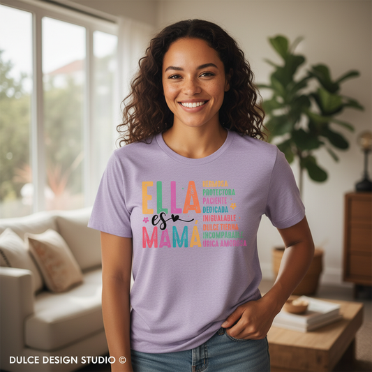 Woman wearing a purple t-shirt with colorful text in a living room
