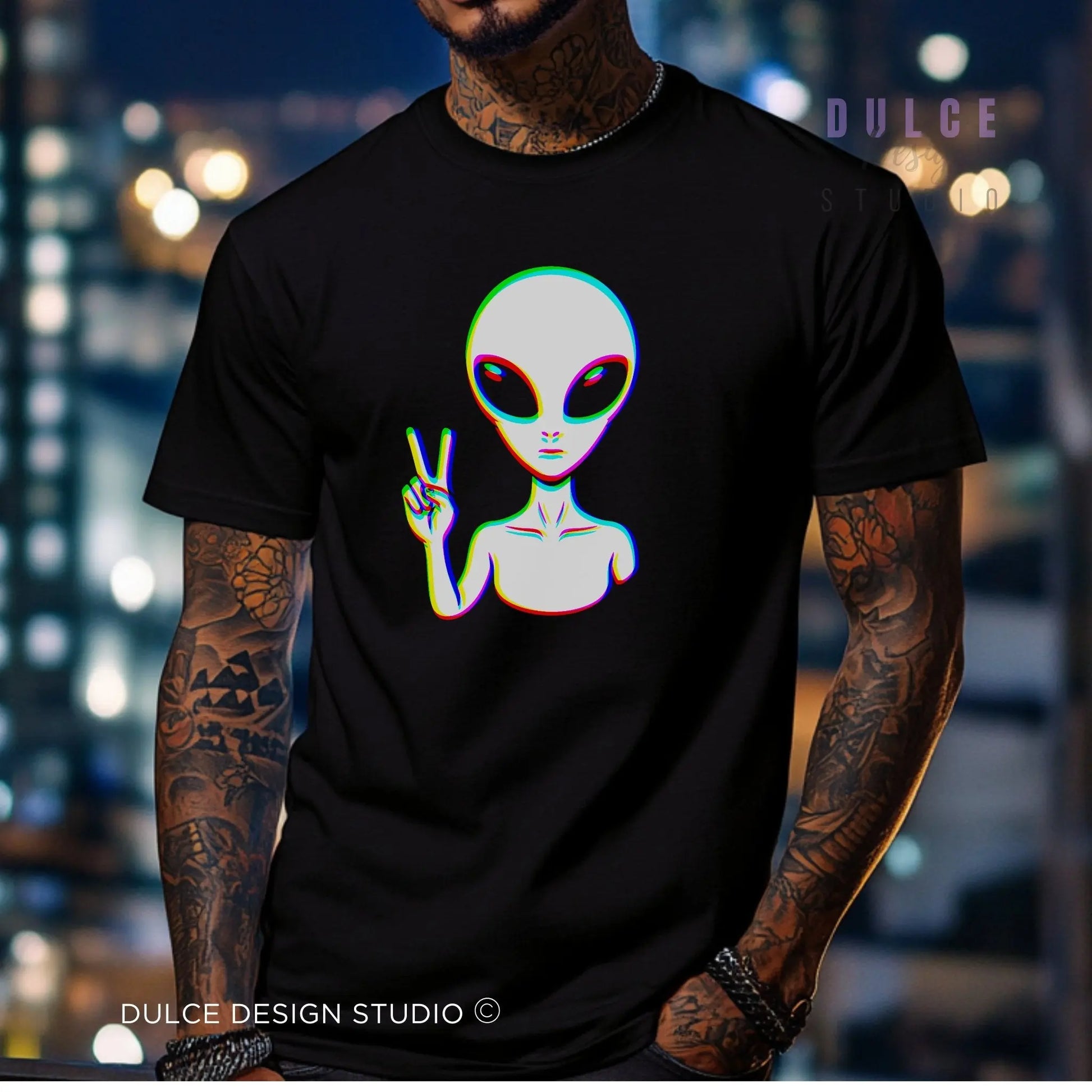 man wearing a glitch edm effect alien graphic on ablack tshirt