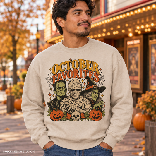 Man wearing sand October Favorites Halloween crewneck outside an autumn movie theater