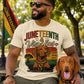 Man wearing a 'Juneteenth & Vizslas' t-shirt with a dog, sitting outdoors.