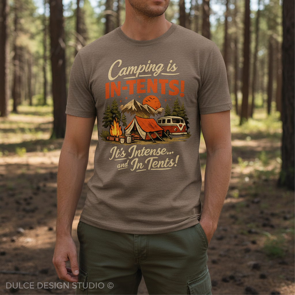 Person wearing a t-shirt with a camping graphic and text in a forest setting