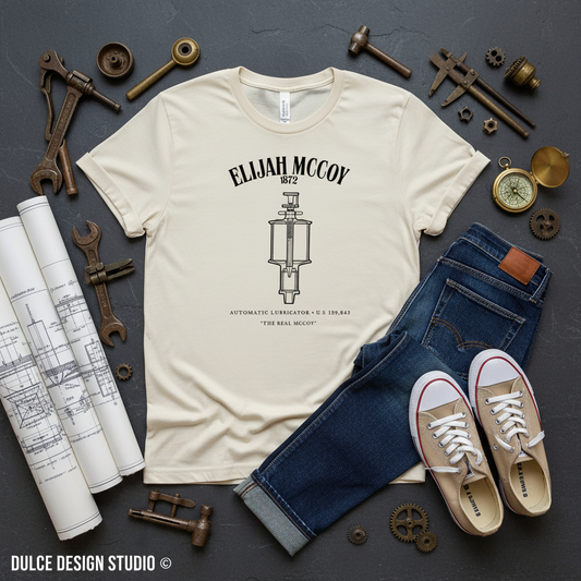 Soft Cream Elijah McCoy Automatic Lubricator Tee Flat Lay