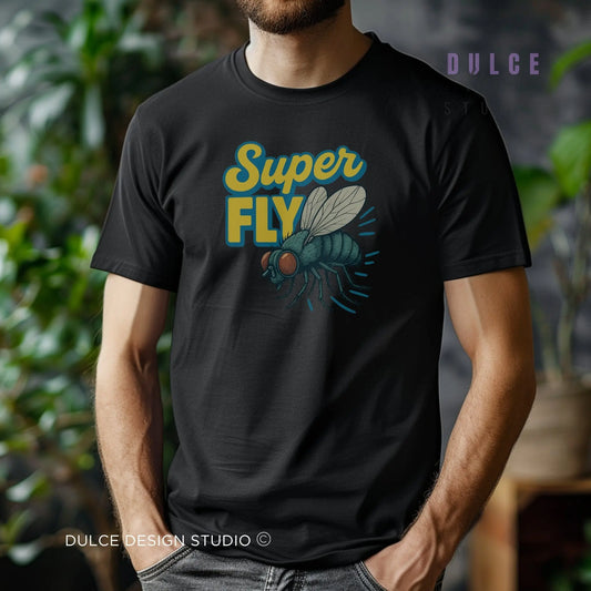 Person wearing a black t-shirt with 'Super Fly' graphic design, standing in a blurred indoor setting.