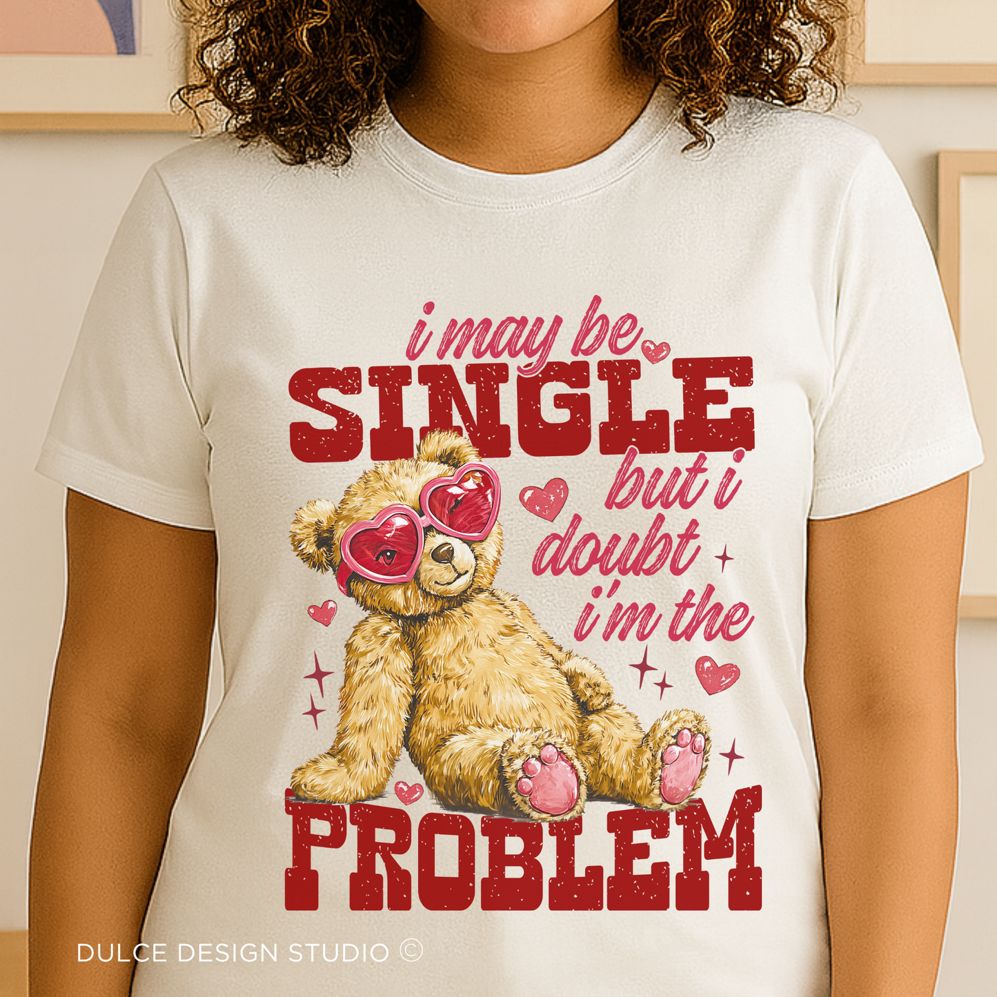 Bella+Canvas 3001 tee featuring teddy bear in heart sunglasses with “I may be single but I doubt I’m the problem” quote