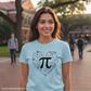 Woman wearing light blue t-shirt with science Pi design