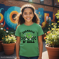 Young girl in kelly green youth tee